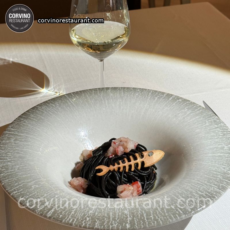 Spaghetti with squid ink, garlic, oil and shrimp tartare Spaghetti with squid ink, garlic, oil and shrimp tartare